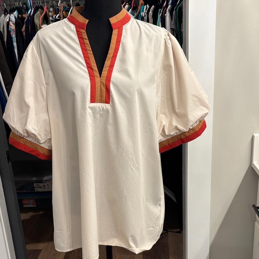 Elegant Cream Blouse with Red Accents